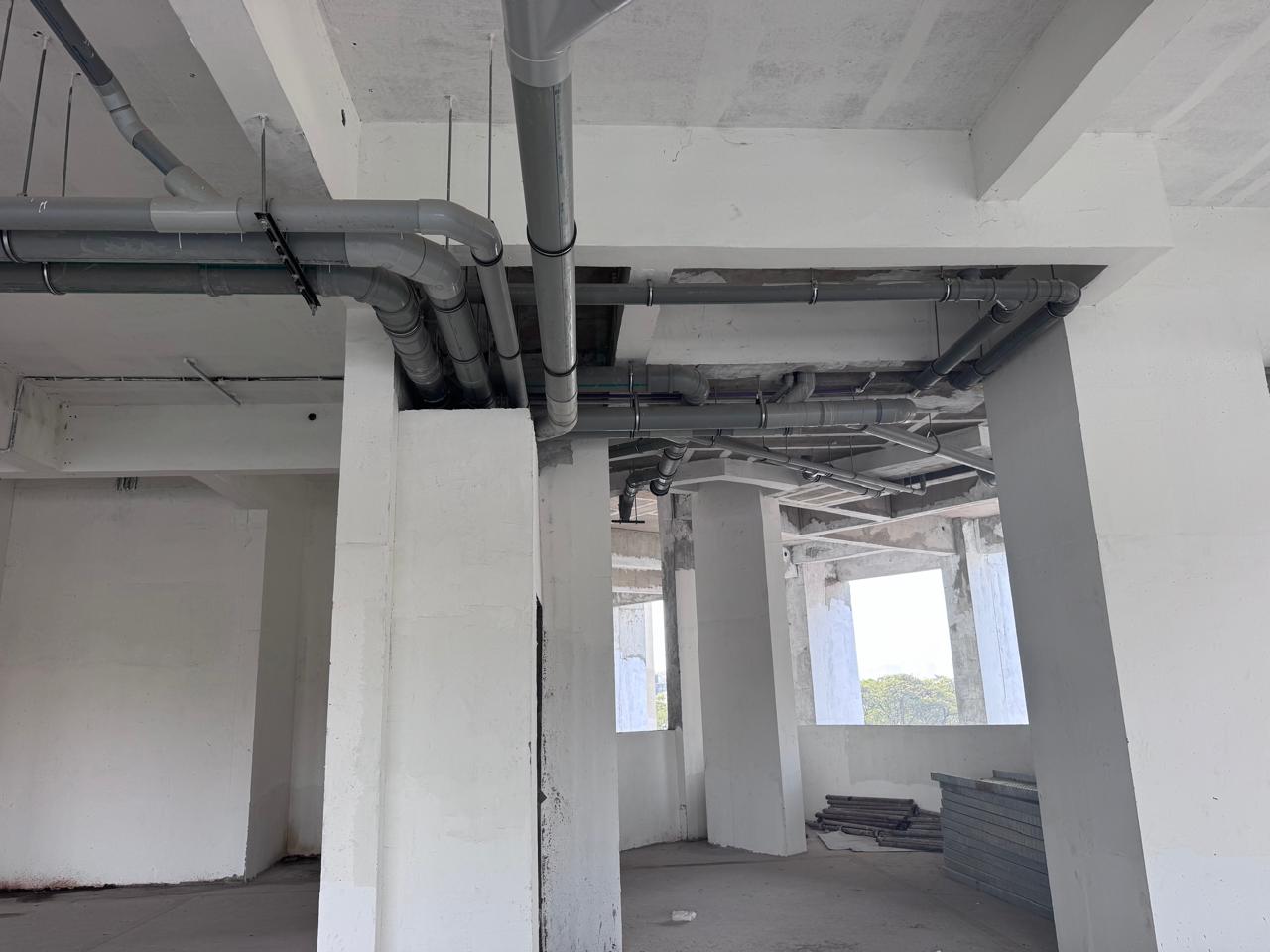 Coordinated plumbing services routing in basement ceiling